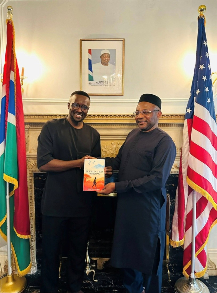 Gambian Author Gifts Memoir to Ambassador in D.C.